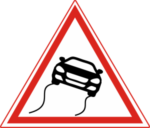 Which of the following indicates "Slippery Road"